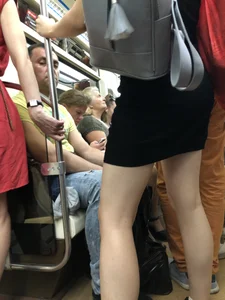 Girl with Hot Ass and Legs with Pale Skin in a Dress Standing in a Subway Train Candid Closeup