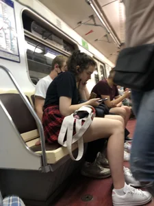 Cute Girl With Nice Legs in the Subway Train Candid Pics Gallery