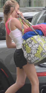 Girl with Hot Thin Legs in Shorts Pitting Stuff into Her Car Candid Gallery