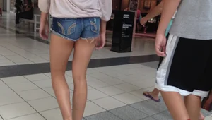 Skinny and leggy teen at the mall in short jean shorts