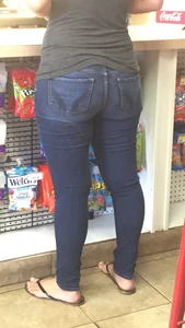 Chubby Candid Ass in Tight Blue Jeans and Feet in Slippers at the Store