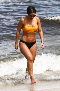 Frankie Bridge nip slips in a bikini on the beach