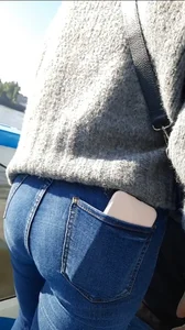 Brunette in tight blue jeans