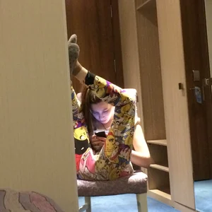 Skinny Teen JB in Tights Sitting with Her Legs Leaned against the Closet