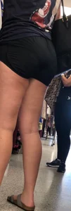 Tall thicc curly blonde in tight black shorts 0927