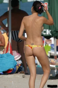Beach voyeur girls in bikinis, thongs and topless