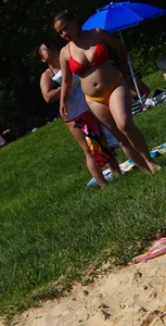 Thick girl with tattoos, big tits and a big booty in a little bikini