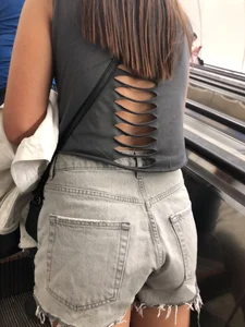 Hot Legs and Ass in Denim Fringe Shorts Escalator Closeup Creepshots
