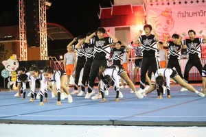 Bunch of athletic Thai cheerleaders at a competition