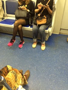 Girl in Black Pantyhose and a Skirt Subway Candid