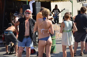 Hot ass Canadian babe in a bikini dancing at a concert