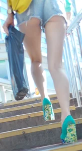 Girl on High Heels Walking Up the Stairs in Shorts - Perfect Legs