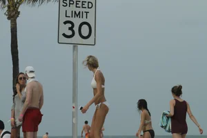 Saint Patrick's Day girls in bikinis at Deerfield Beach in Florida