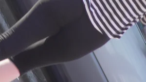 Strawberry blonde cutie showing stomach and in leggings