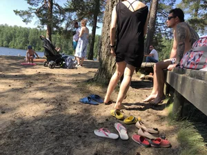 Candid Girl Putting On Swimsuit and Undressing at the Forest Lake Beach Gallery