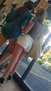 Skinny Candid Girl in White Shorts Making an Order in a Cafe Creepshots Gallery