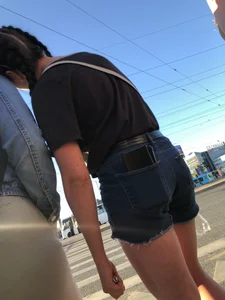 Cute candid teen wearing denim shorts crossing the street, awesome muscly legs