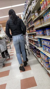 Sexy Asian girl grocery shopping in tight jeans with a nice ass