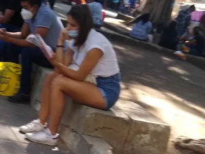Long-legged girl, distracted