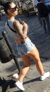 Nice legs and a little peach showing, shorts