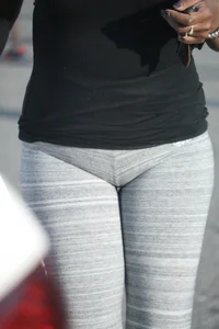 Ebony milf out shopping in grey leggings