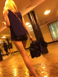 Tall Blonde Girl with Long Muscular Legs Candid