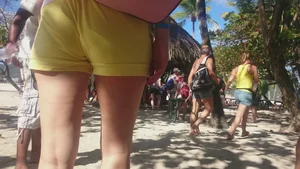 Milf in yellow shorts with vpl and a wedgie