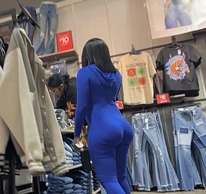 Thick mesmerizing ebony in a tight blue one piece