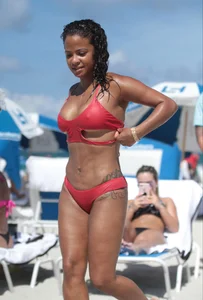 Christina Milian in red bikini in Miami with hard nipples