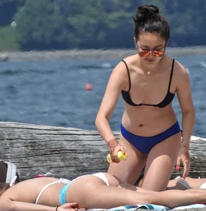 Blondie and two asian girls put on sunscreen (pt 2) [062]