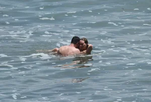 Hilary Duff in purple bikini in Malibu with a great ass and hard nipples