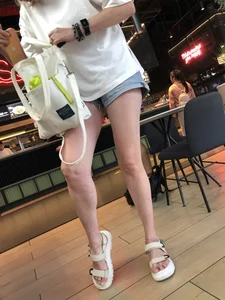 Candid blonde with hot legs at the foodcourt creepshots