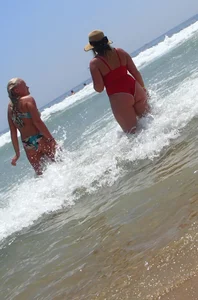 Thick big booty girl in a swimsuit with blonde friend in a bikini