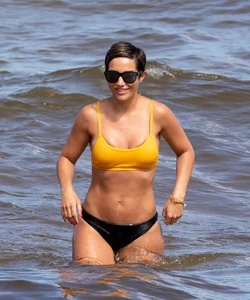 Frankie Bridge nip slips in a bikini on the beach