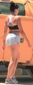 Ebony babe in Hooters shorts out for a run and walk