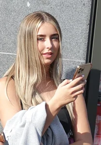 Blonde teen in black leggings, her sweater ruined my fun