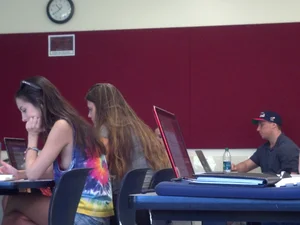 College girl in class showing sideboob with no bra on