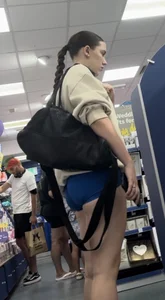 Stunning cheeked up gym girl shopping in blue shorts (OC)
