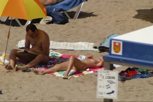 Girls on a nude beach in Sitges, Spain