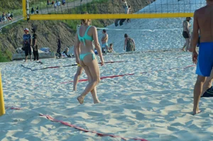 Girl in Green Swimsuit with Hot Body Playing Volleyball on the Beach Candid Gallery