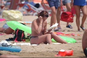 Girls on a nude beach in Bibione, Italy