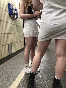 Group of Teens in Short Dresses in a Subway Train and on an Escalator Gallery