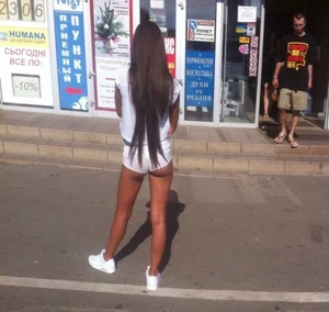 Hot Tanned Girl with Long Dark Hair in White Mini-Shorts City Candid
