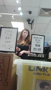 Girl at the record store in shorts with a nice booty and vpl