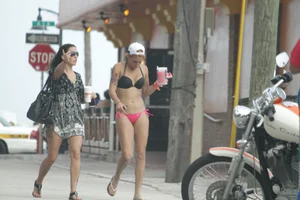 Saint Patrick's Day girls in bikinis at Deerfield Beach in Florida