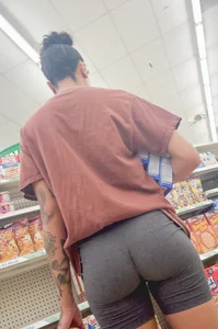 Tatted Mixed babe in tight cotton gray shorts