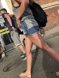 Girl in Denim Mini Shorts and Sandals With Sexy Legs And Feet Street and Subway Photos