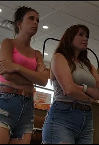 Sexy MILF in Her High Waisted Jean Short and Tight Pink Tanktop w/ Her Redheaded Friend w/ a Pretty Nice Thick Ass