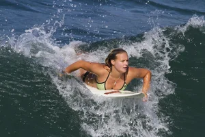 Candid surfer babes on the beach and in bikinis