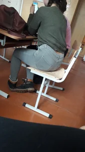 College Teen in Blue Tight Jeans Bending Over Desk in Classroom   Candid Closeup Photos